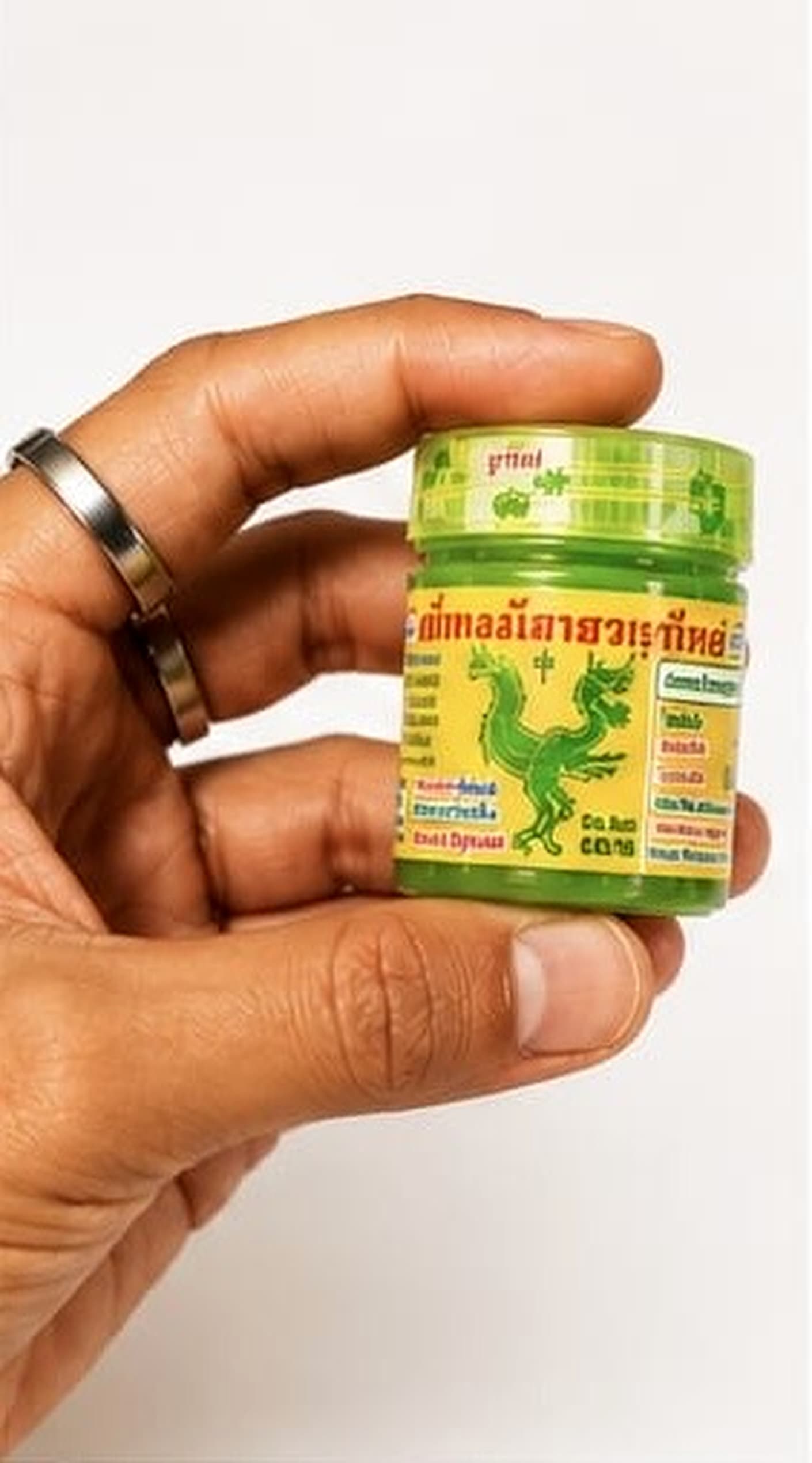 Hong Thai inhaler held in a hand for scale
