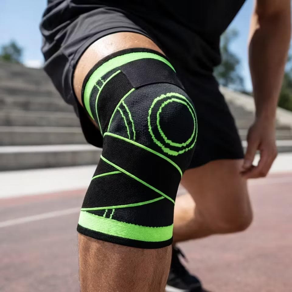KniTec v2 support with adjustable straps worn on a knee during an outdoor training session